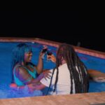 Spice has wine with her male lead in the music video for 'Ex Boyfriend.'