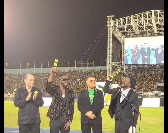 Beenie Man and Bounty Killer celebrate receiving citations from Prime Minister Andrew Holness at the Jamaica Grand Gala.