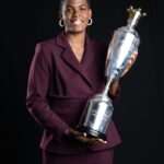 Khadija Shaw holds her 2023/24 PFA Women's Player of the Year award.