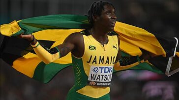 Antonio Watson celebrates after winning the men's 400m title at the 2023 IAAF World Championships in Budapest, Hungary.