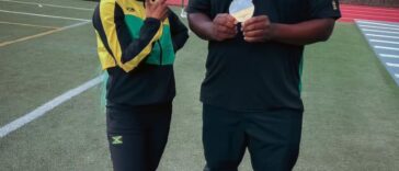 Shelly-Ann Fraser-Pryce with her former coach, Elite Performance Track Club's Reynaldo Walcott.