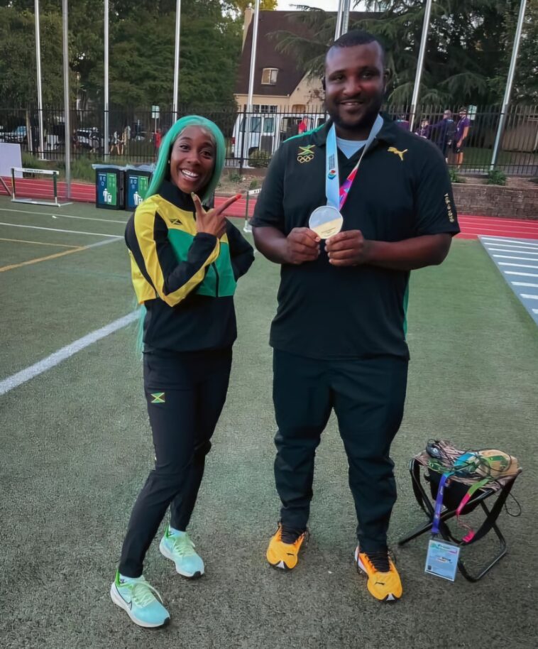 Shelly-Ann Fraser-Pryce with her former coach, Elite Performance Track Club's Reynaldo Walcott.