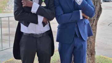 Bounty Killer and Beenie Man celebrate their Order of Distinction at Kings House.