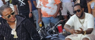 Masicka and Teejay on the set of the music video for 'Never Complain'