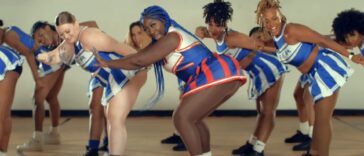 Spice vibes with her dancers during the music video for 'Hell No.'
