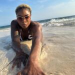 Jully Black looking scintillating on the beach.