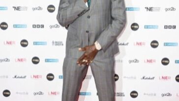 Vybz Kartel poses on the MOBO Awards red carpet.