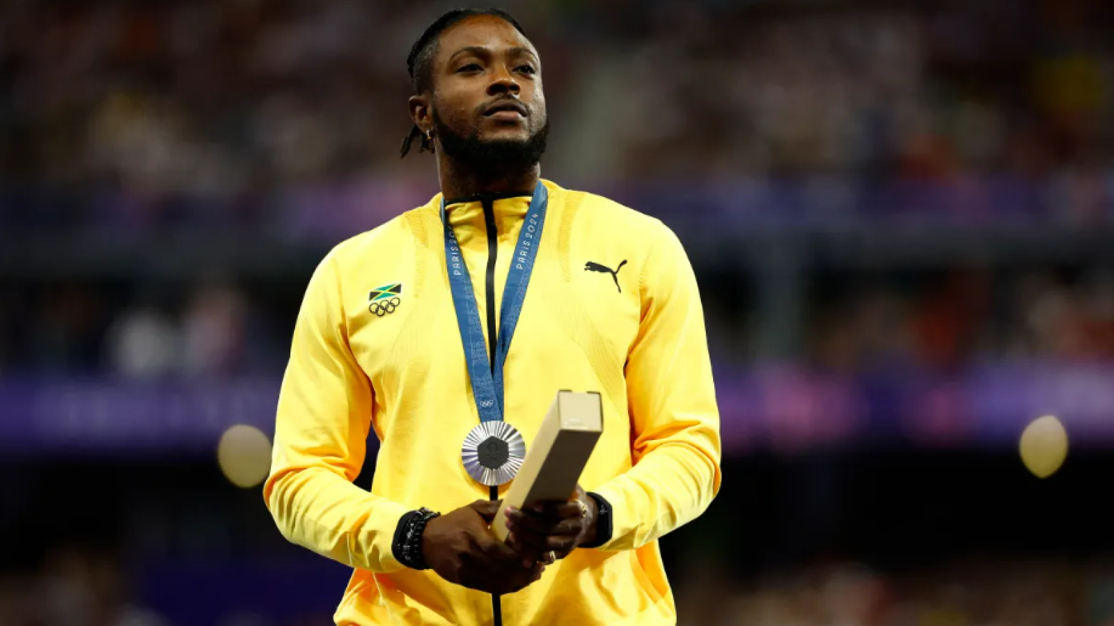 Kishane Thompson cherishes his silver medal at the Paris 2024 Olympics.