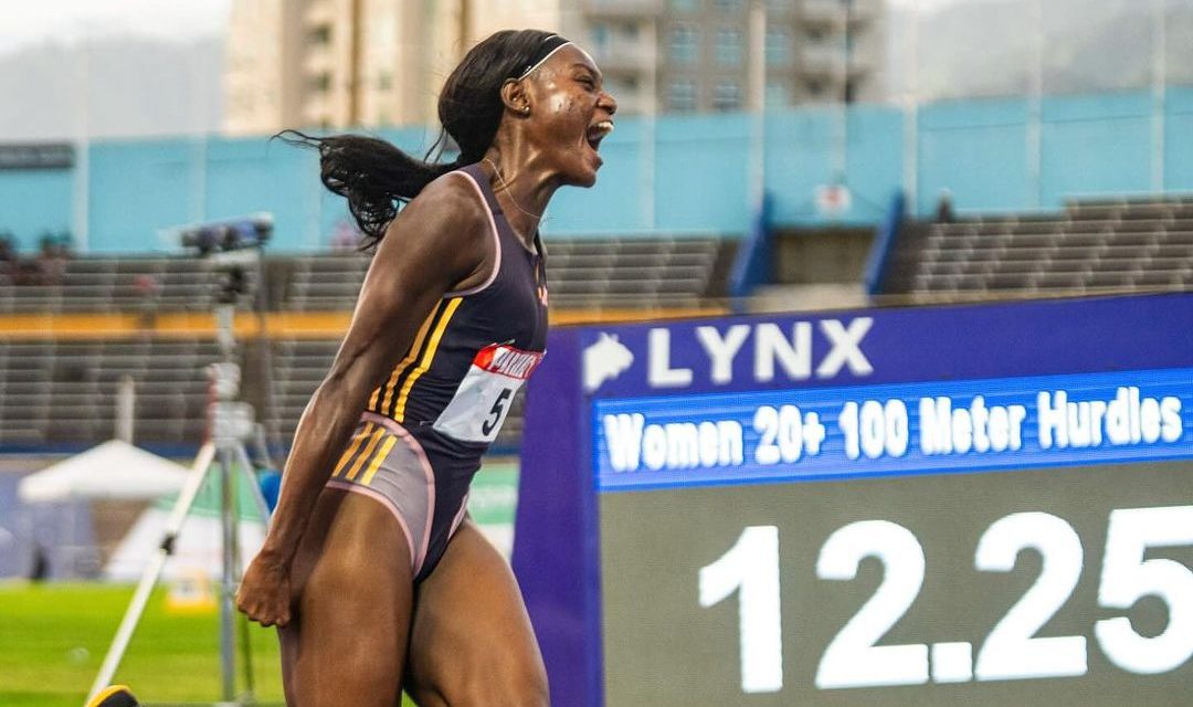 Ackera Nugent celebrates after winning a race.