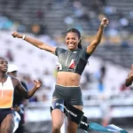 Gabby Thomas crosses the finish line after winning the women's 200m at the Grand Slam Track meet in Kingston, Jamaica