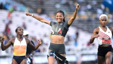 Gabby Thomas crosses the finish line after winning the women's 200m at the Grand Slam Track meet in Kingston, Jamaica