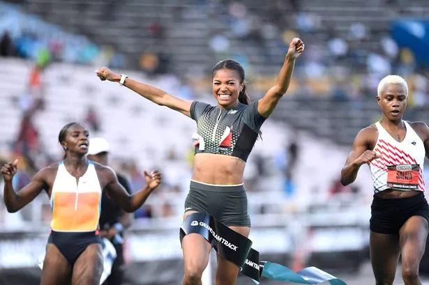 Gabby Thomas crosses the finish line after winning the women's 200m at the Grand Slam Track meet in Kingston, Jamaica