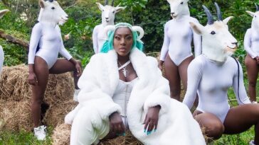 Spice and her dancers dress up for her music video for "G.O.A.T."