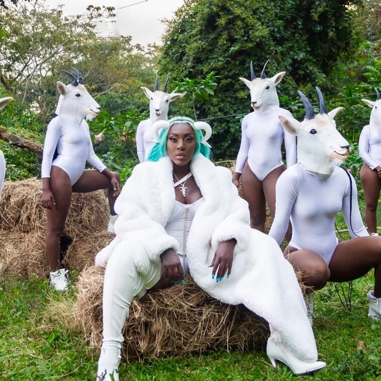 Spice and her dancers dress up for her music video for "G.O.A.T."