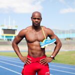 Asafa Powell models on the track.