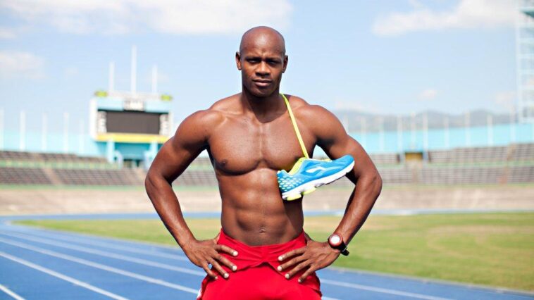 Asafa Powell models on the track.