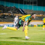 Warner Brown celebrates scoring a goal against Guatemala in 2026 World Cup qualifying.