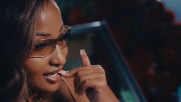 Shenseea bites her lip during her music video for 'Self Love'