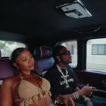 Masicka rolls around in the streets during the music video for 'Rich Sex.'