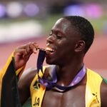 Team Jamaica star Oblique Seville celebrates with his gold medal at the 2025 IAAF World Championships in Tokyo.