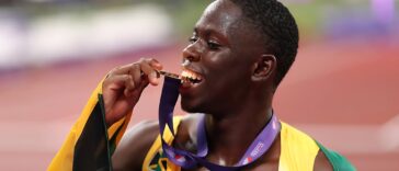 Team Jamaica star Oblique Seville celebrates with his gold medal at the 2025 IAAF World Championships in Tokyo.