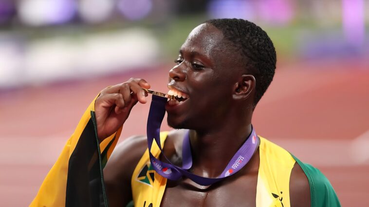 Team Jamaica star Oblique Seville celebrates with his gold medal at the 2025 IAAF World Championships in Tokyo.