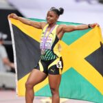 Tina Clayton celebrates after winning the silver medal in the women's 100m at the 2025 IAAF World Championships.