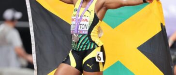 Tina Clayton celebrates after winning the silver medal in the women's 100m at the 2025 IAAF World Championships.