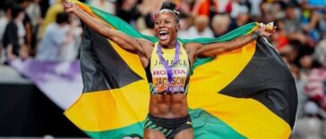 Shericka Jackson celebrates following the women's 200m final at the 2025 IAAF World Championships in Tokyo.