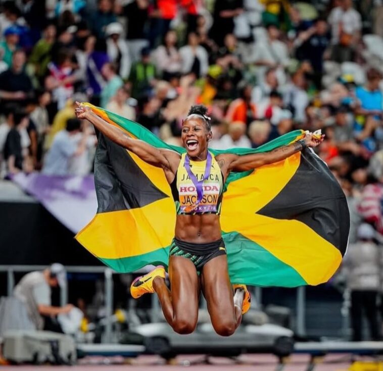 Shericka Jackson celebrates following the women's 200m final at the 2025 IAAF World Championships in Tokyo.