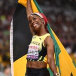 Shelly-Ann Fraser-Pryce celebrates after her final race at Tokyo 2025