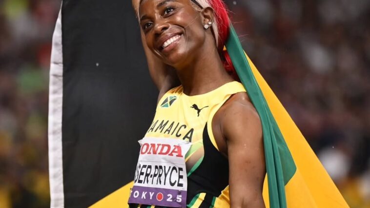 Shelly-Ann Fraser-Pryce celebrates after her final race at Tokyo 2025