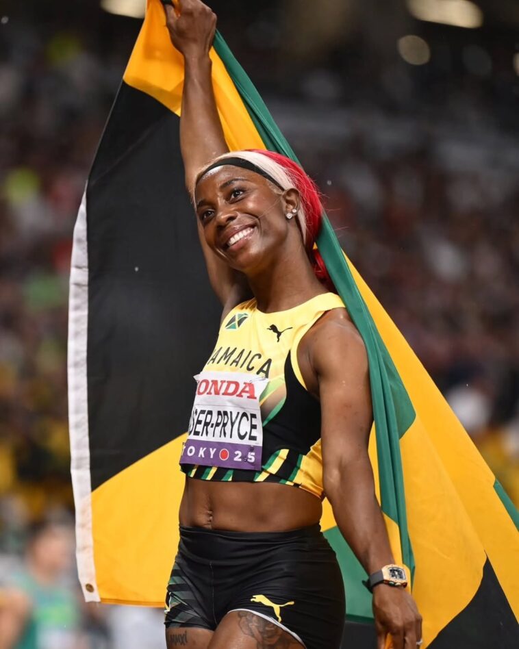 Shelly-Ann Fraser-Pryce celebrates after her final race at Tokyo 2025
