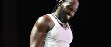 Mavado performs and looks on the crowd.