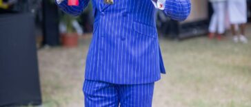 Yohan Blake accepts his national award, the Order of Distinction in the rank of Commander, on Oct. 20, 2025.