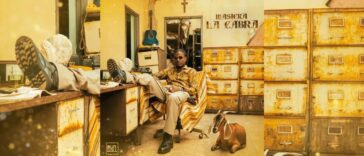 Masicka kicks his feet up during the music video for "La Cabra."