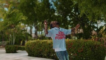 Popcaan looks to the sky while shooting the music video for 'Immortal Life.'