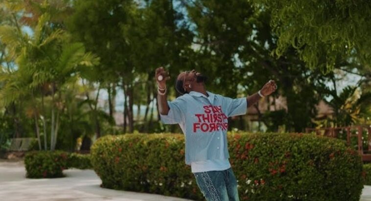 Popcaan looks to the sky while shooting the music video for 'Immortal Life.'