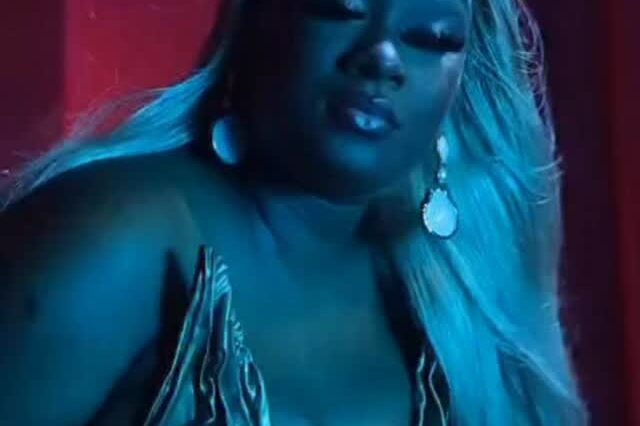 Shaneil Muir looks seductive on the set of her music video for 'Likkle Miss.'