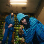 Protoje and Damian Marley flex in the music video for "At We Feet."