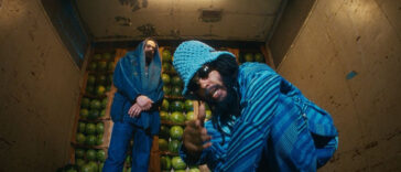 Protoje and Damian Marley flex in the music video for "At We Feet."