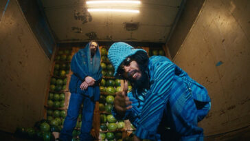 Protoje and Damian Marley flex in the music video for "At We Feet."