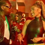 Vybz Kartel and Shenseea vibe on their set of their music video for the single, "Panic."
