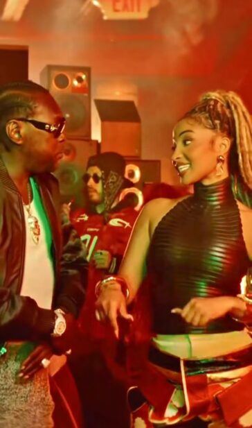 Vybz Kartel and Shenseea vibe on their set of their music video for the single, "Panic."