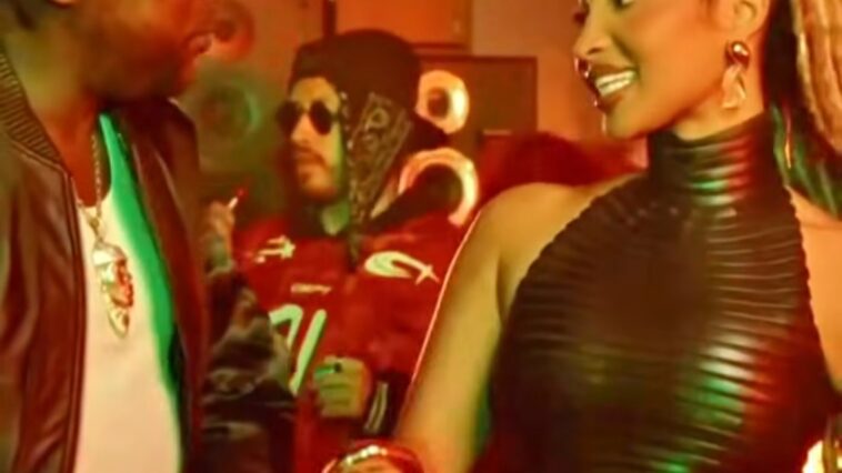 Vybz Kartel and Shenseea vibe on their set of their music video for the single, "Panic."