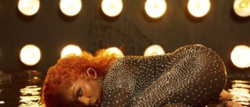 Spice positions herself in the music video for "Degree."