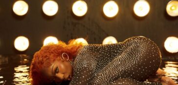 Spice positions herself in the music video for "Degree."