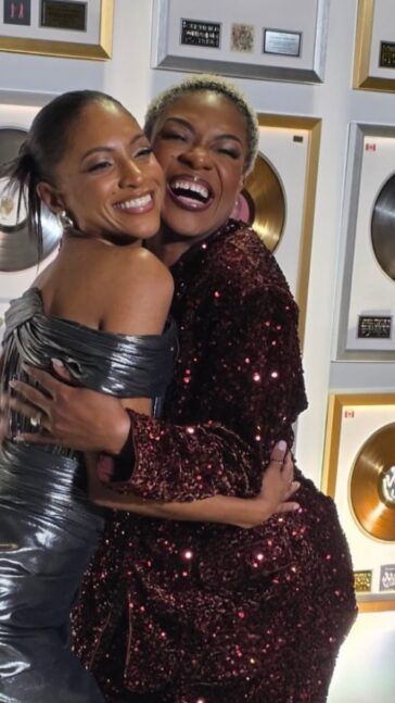Naomi Cowan and Jully Black hug on the red carpet at the 2026 Juno Awards.