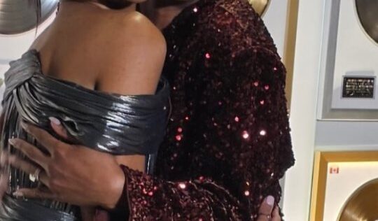 Naomi Cowan and Jully Black hug on the red carpet at the 2026 Juno Awards.