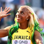 Mommy Rocket waves to the crowd at the 2022 IAAF World Championships